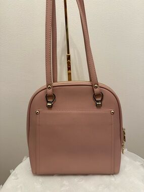 Miztique Pink backpack shoulder bag with gold accents